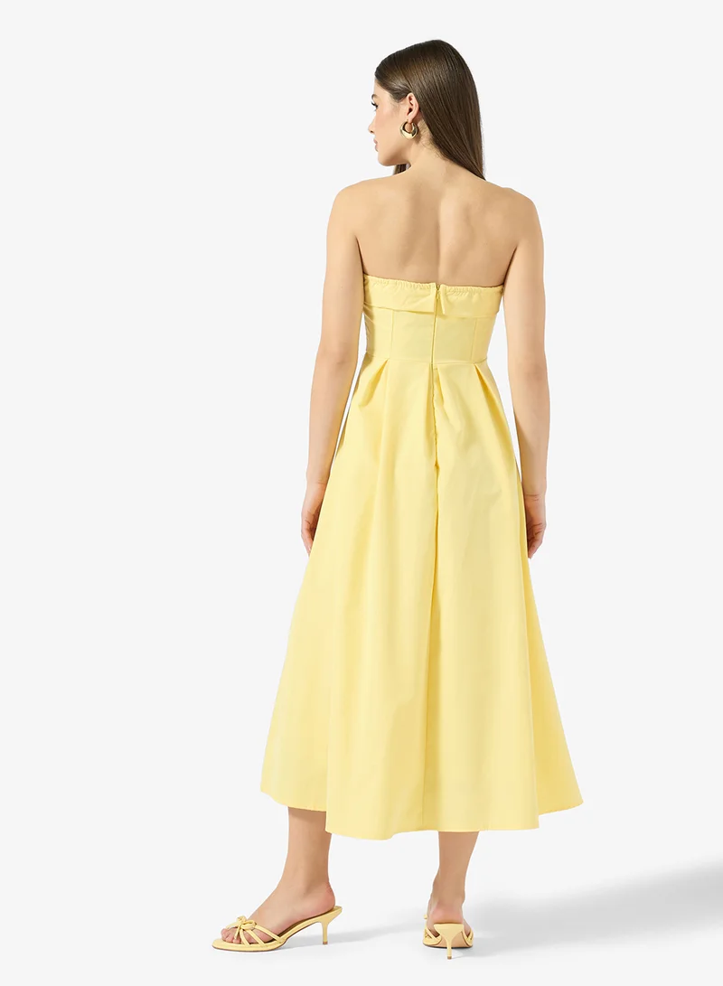 جينجر فستان بقصة أميرة بخصر منخفض وكتف مكشوف